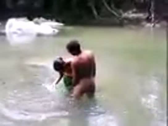 Desisex video of a young couple enjoying outdoor sex in a pond